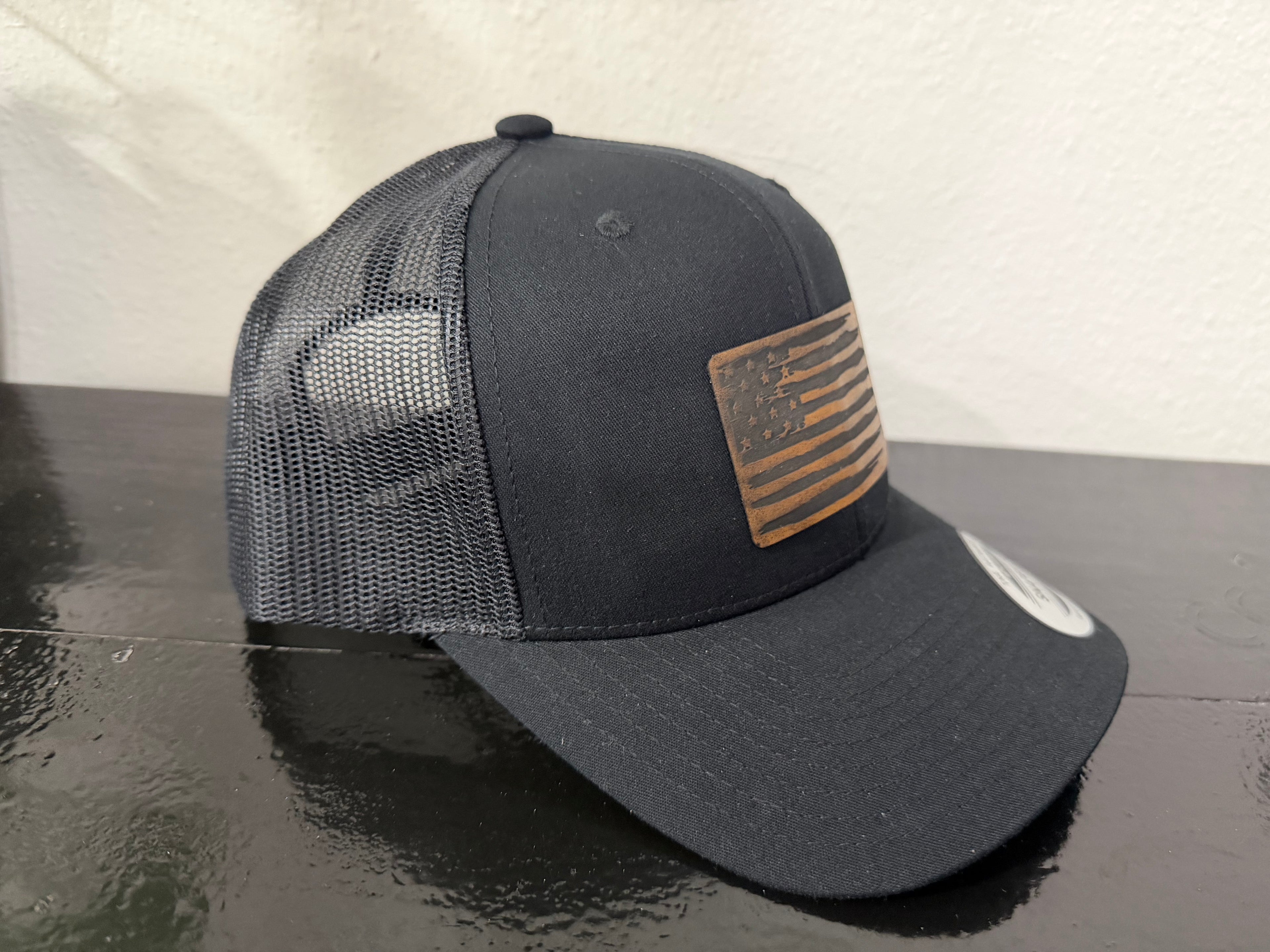 Distressed American Flag Yupoong trucker hat