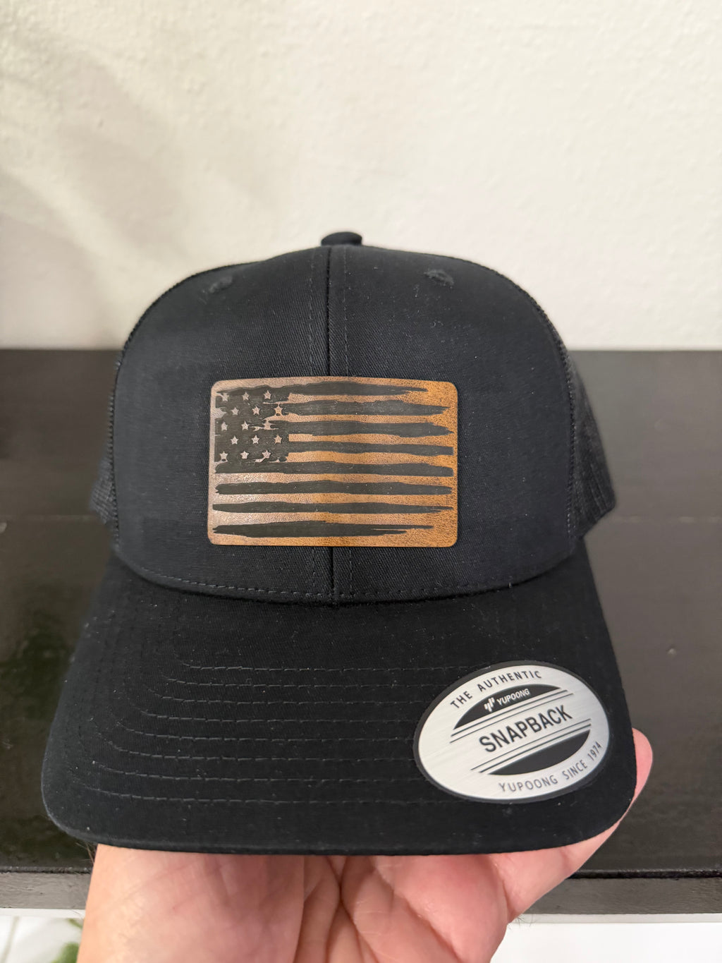 Distressed American Flag Yupoong trucker hat