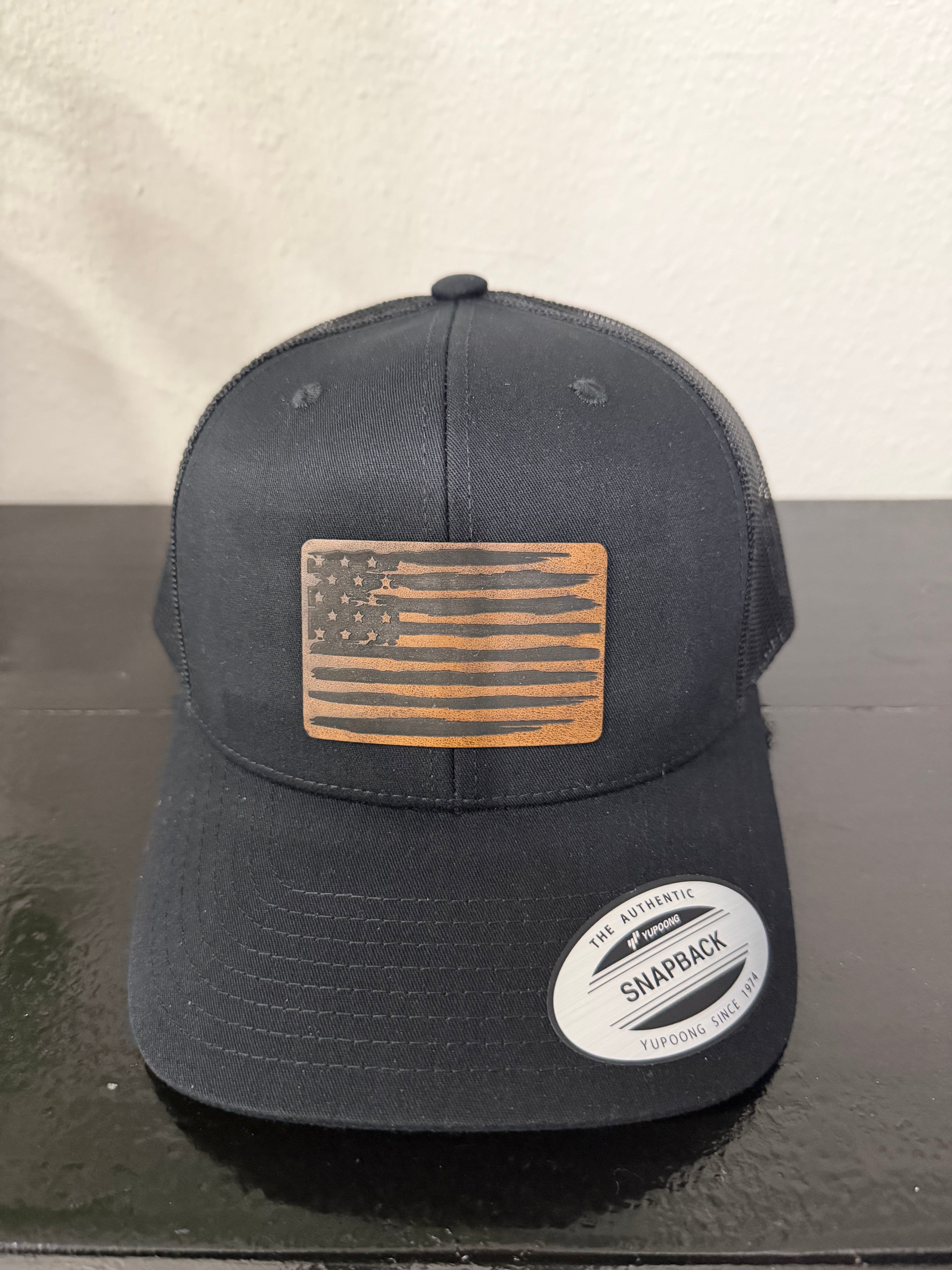 Distressed American Flag Yupoong trucker hat